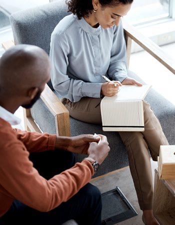 A man participates in therapy at a drug rehab.